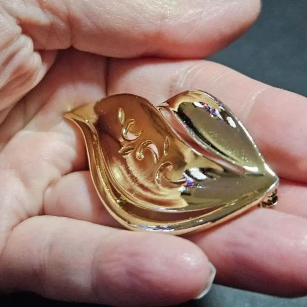 AJC vintage gold tone brooch